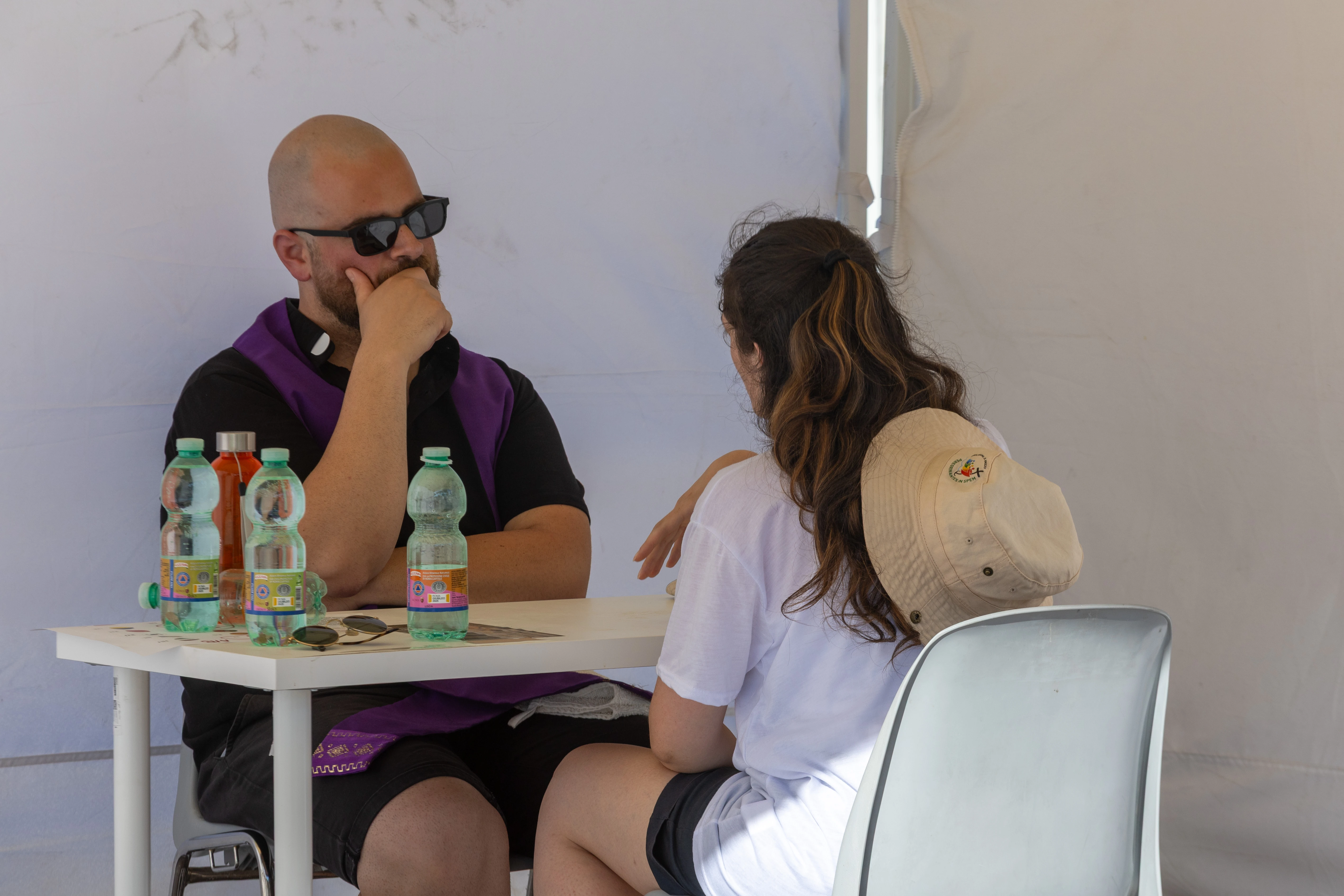 A priest listens to a penitent during confession during a reconciliation event at the Circus Maximus, Rome, Friday, Aug. 1, 2025?w=200&h=150