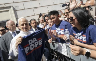 The Muñoz family gives Pope Leo XIV a T-shirt that reads “Da Pope” after Mass in Albano, Italy, on Sunday, July 20, 2025. Credit: Vatican Media